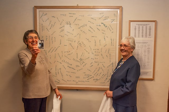 Sisters Brenda Smith and Janet March, whose grandmother May Jewell embroidered Crowcombe's ‘Electricity Fund Signature Cloth’ in the 1950s.