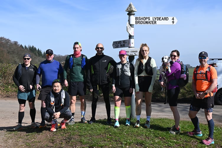 Aurora Foxes and Hilton Hotels staff who ran from the Quantock Hills to Minehead to fund-raise for the charity Down's Syndrome Association.