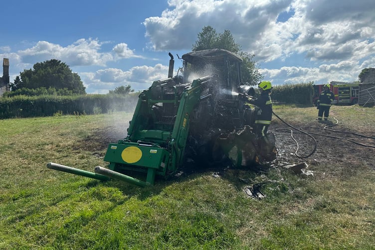 Firefighters tackle a previous tractor blaze.