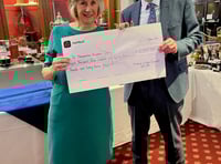 Cheque for nearly £10,000 presented to hospice by golf club 