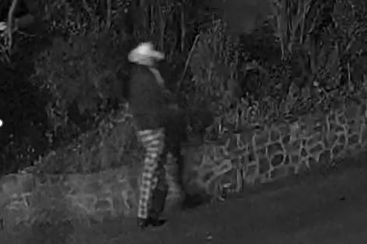 An image taken from CCTV of a man police want to speak to in connection with alleged hate crimes against Jehovah's Witnesses in Minehead.