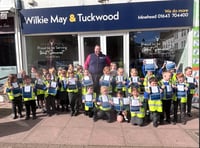 Pupils turn estate agent to 'sell' their school