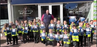 Pupils turn estate agent to 'sell' their school