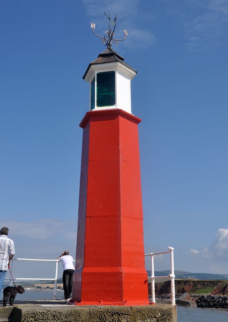 The red painted Watchet Lighthouse has to become green to comply with navigational aid regulations.