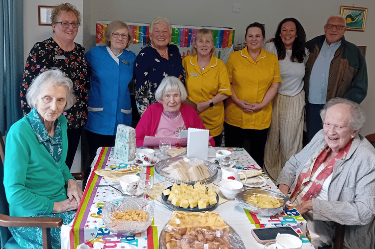  Connie Matthews (centre) is pictured with guests and staff enjoying her 105th birthday party in Croft House, Williton.