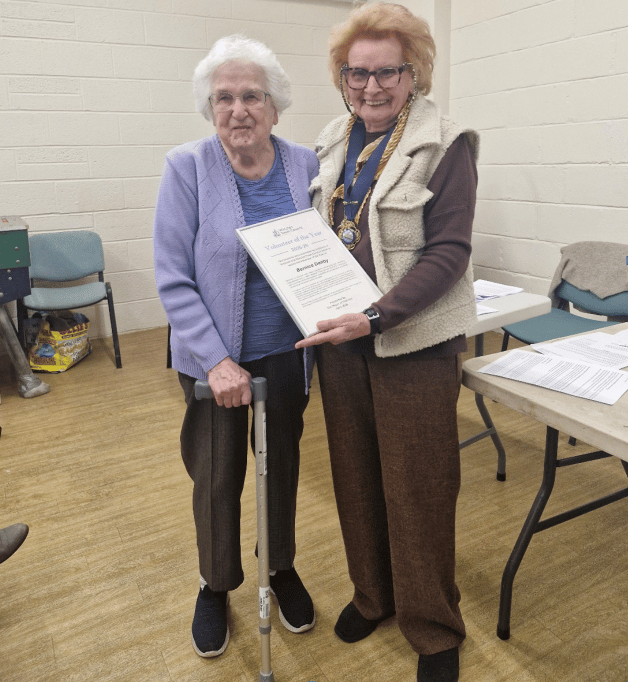 Watchet's 'Volunteer of the Year' award went to Bernice Danby (left), pictured receiving her certificate from the mayor Cllr Loretta Whetlor.