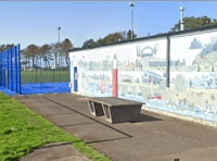 Join street artist Charlie McFarley to create mural