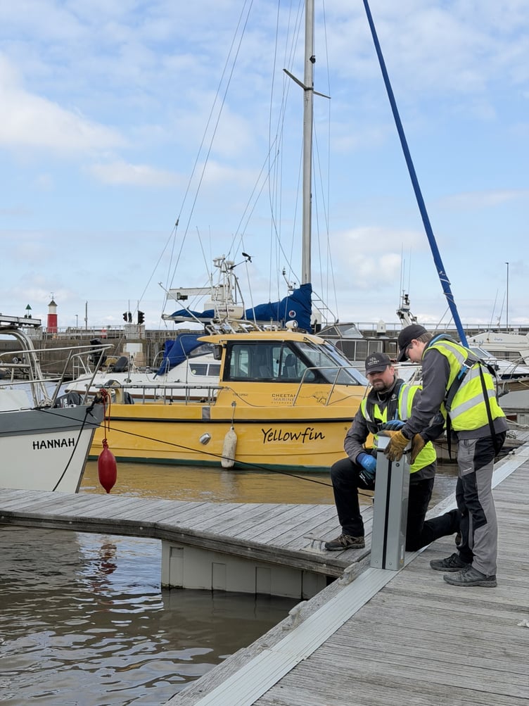 New Rolec bollards being fitted in Watchet Marina as part of improvements promised by new owners Western Marinas.