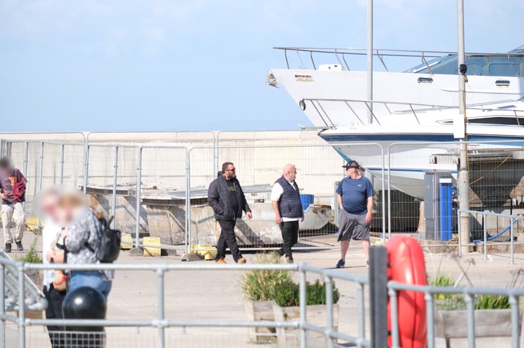 Some of the cocaine smugglers photographed by NCA officers beside Watchet Marina (left to right) Raymond Nuttall, Colin Benson, and Craig Nuttall.