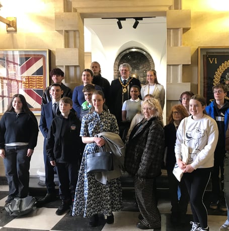 Somerset Council chairman Cllr Mike Best greets new members of the Somerset Youth Parliament.