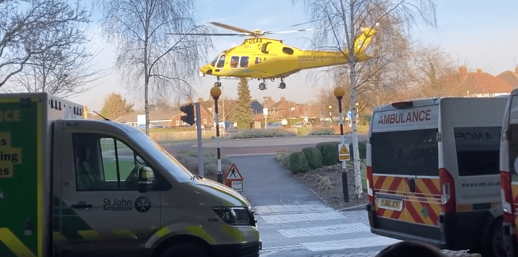 A Dorset and Somerset Air Ambulance taking off from Musgrove Park Hospital's helipad.