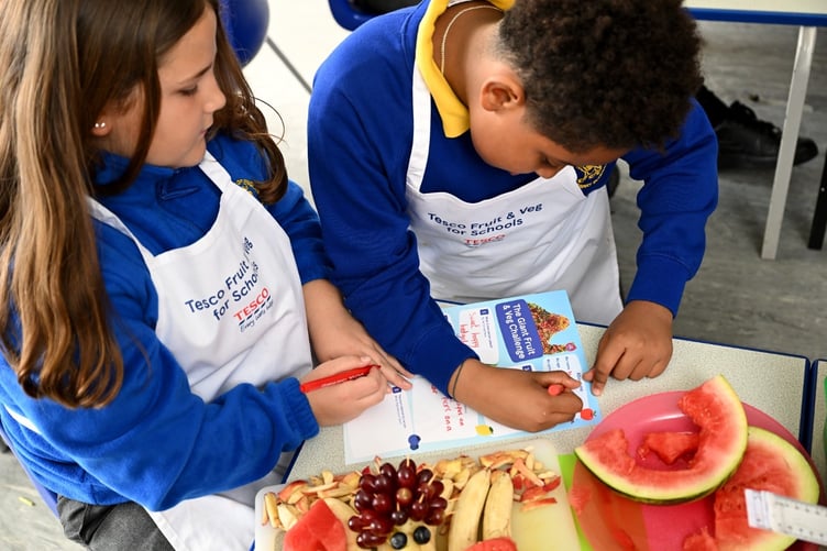 Children taking part in Tesco's fruit and veg initiative.