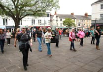 Minehead sees flashmob of line dancers for internationally co-ordinated event