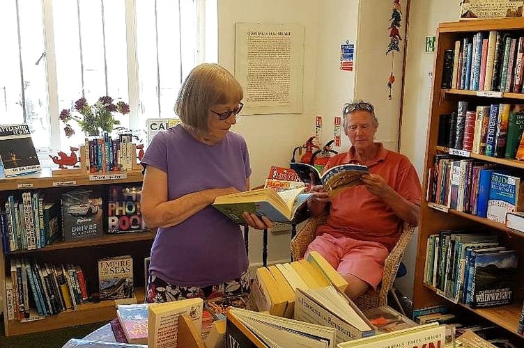 Jeff Bird (seated) whose retirement with his wife Mary means Watchet Harbour Community Bookshop will close.