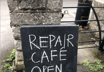 Repair café volunteer groups sharing knowledge and skills to improve each other