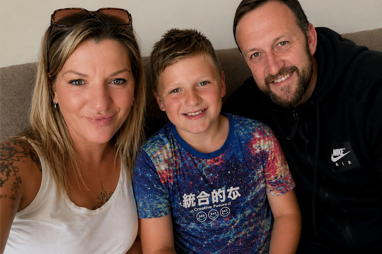Williton parents Charlotte Finch and Matt Kingdon with their son Teddy, for whom they are trying to find a SEND unit place.
