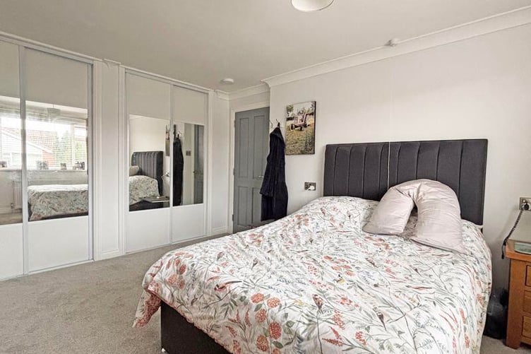 The master bedroom and a further double bedroom both have built in wardrobes