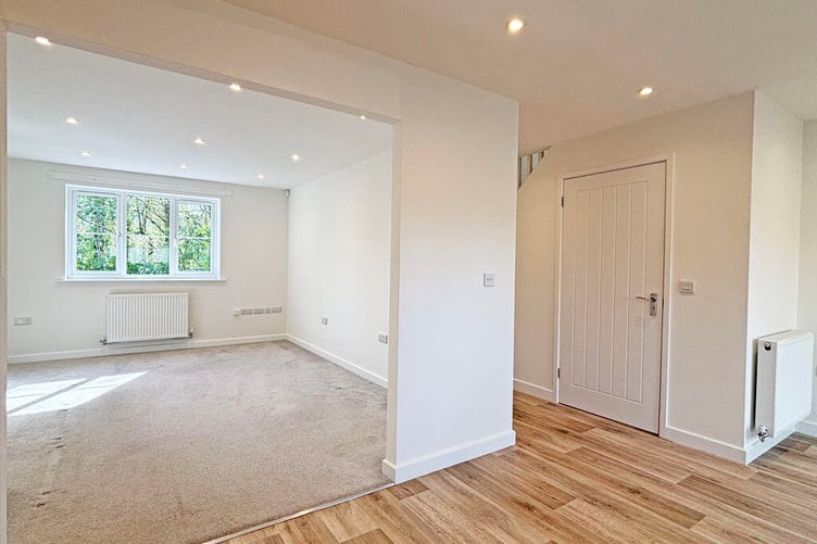 The sitting room is a generous size with ample space for everyday furnishings