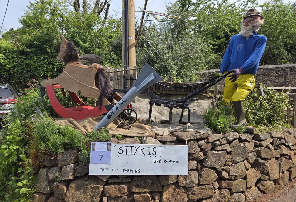 'Postie with the Mostie' Adam delights villagers