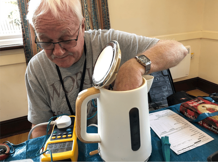 A kettle being mended at Carhampton Repair Café.