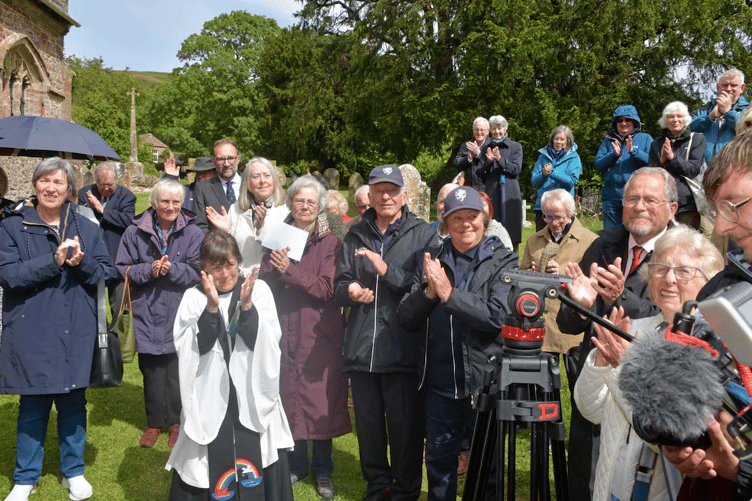 Some of those attending a service to dedicate new doors for St George's Church, Bicknoller, in memory of village-born Somerset cricketer Harold Gimblett. PHOTO Alain Lockyer.