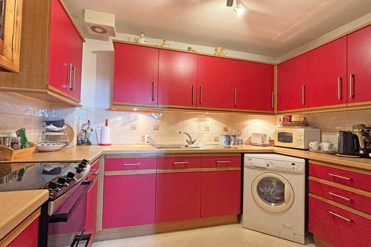 The kitchen itself is fitted with a comprehensive range of wall and base units with complementary work surfaces.
