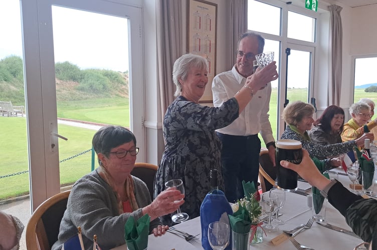 A dinner toast to the links between Watchet and Saint Renan, in France, is given by respective twinning society chairmen Marilyn Binding and Patrick Bligny.