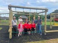 Pupils open village's new play equipment