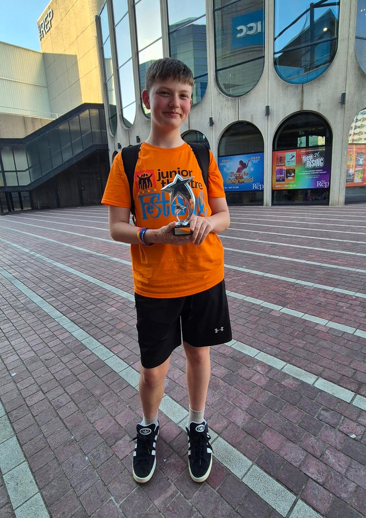 Ethan Williams, of Minehead M.A.D.S. youth theatre, with his MTI festival best choreography award.