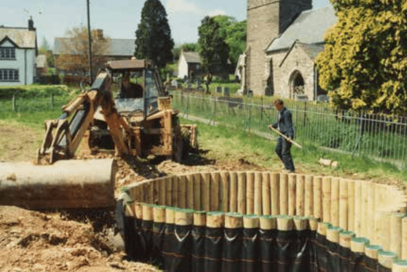 A children's play area being built during the creation of a village green in Brompton Regis 25 years ago.
