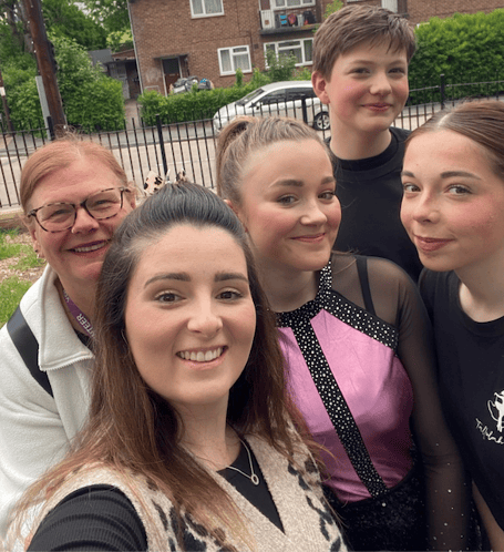 Minehead dance instructor Tara Ely with her successful trio of young dancers.