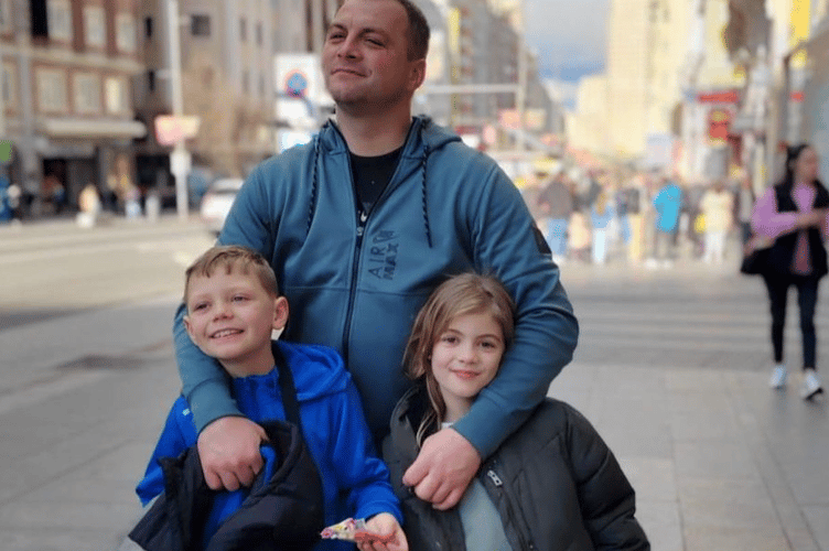 Kamil Mroz with son Viktor and daughter Maya.