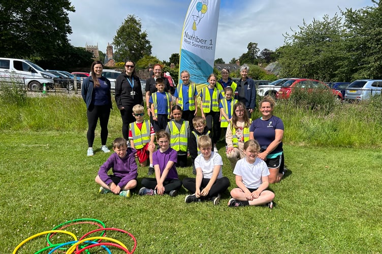 Four children from each of the participating schools pictured along with event organiser Suzanne Richards (right) and some of the other adult helpers