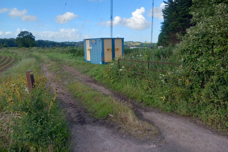 The entrance to farmland near Washford Cross where work has started on a huge solar farm controversially given planning permission.