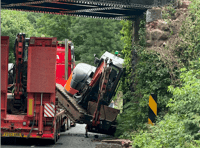 Motorists stop train as bridge is damaged by lorry