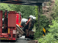Motorists stop train as bridge is damaged by lorry