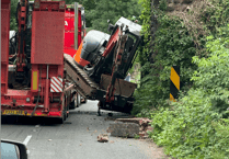 West Somerset Railway trains suspended and road closed after bridge strike