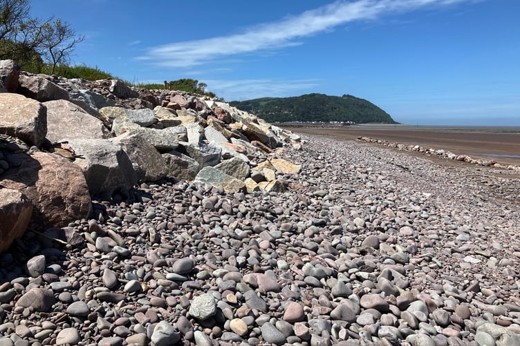 Pink granite rock armour from Cornwall has been added by the Environment Agency to Minehead beach to strengthen sea defences.
