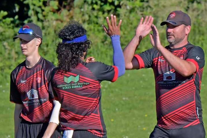 Lakshan Edirisinghe (left) and Luke Desave celebrate taking a Bridgwater wicket.