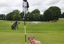 Amanda Mather holes in one on the 136 yard 10th hole