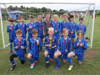 Minehead Pirates' Under 9s celebrate another cup triumph 