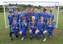 Minehead Pirates' Under 9s celebrate another cup triumph