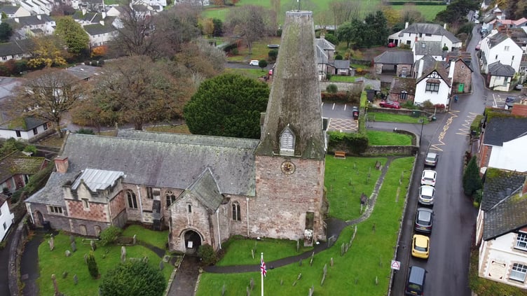 An aerial view of Porlock's St Dubricious Church with its rare oak-built spire. PHOTO: PCC and Freeline Gfx.