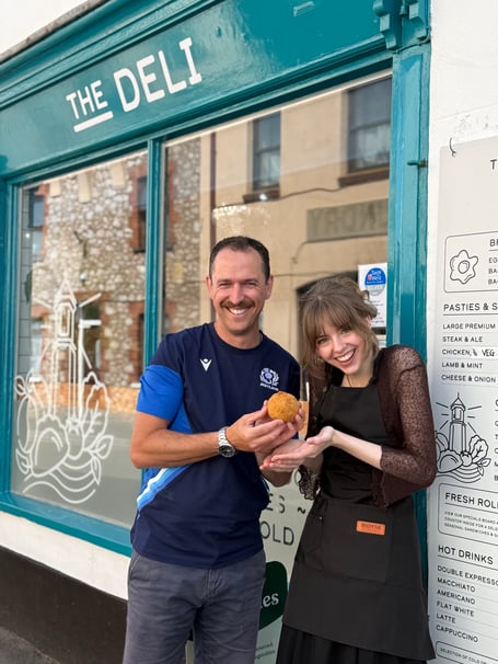 Justin Harris and Elizabeth Fitzgerald with one of the award-winning Scotch eggs made for Watchet's The Deli.