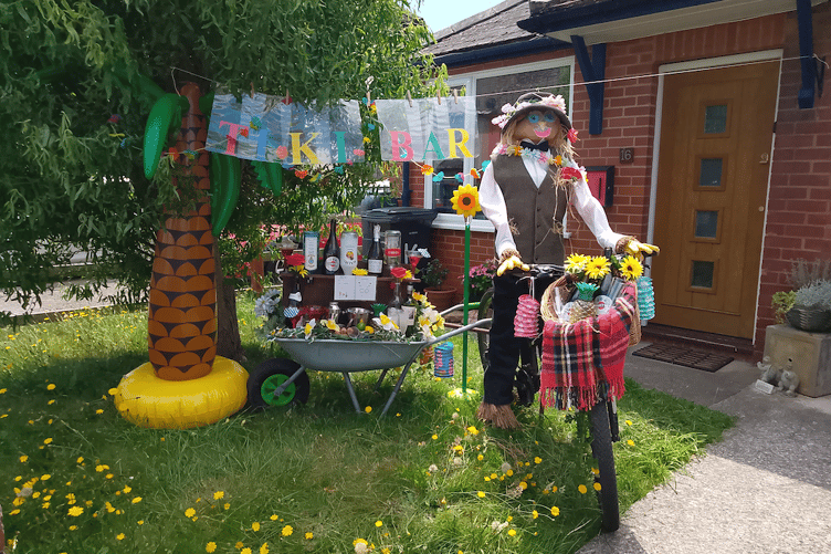 This Watchet resident turned their front garden into a tiki bar to add value to their scarecrow entry.