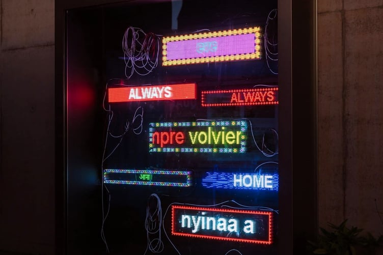 One of the colourful LED signs currently on display in the East Quay Arts Centre, Watchet.