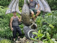 Blacksmiths create huge metal dragon sculpture