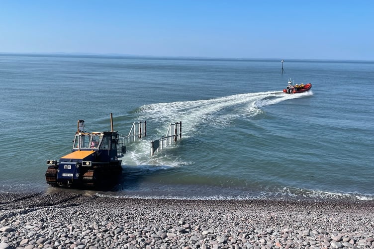 Minehead RNLI's Atlantic 85 lifeboat crew on their way to help rescue an injured walker from rocks near Watchet on Saturday evening.