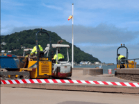 Sand returned to beach after storms