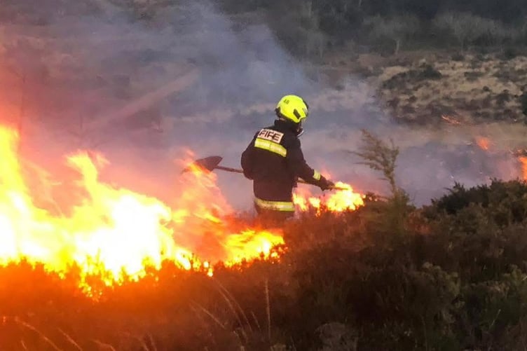 A moorland fire being tackled by Devon and Somerset Fire and Rescue crews.